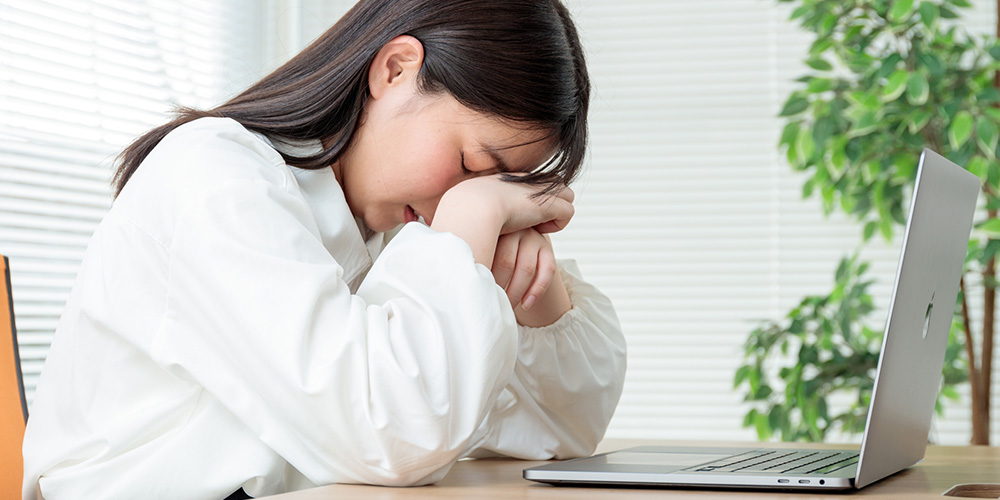 気分がパッとしない女性